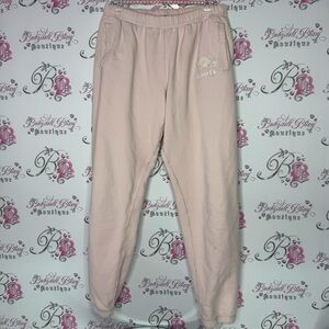 Roots sweatpants joggers light pink with white logo pockets adjustable waist tie